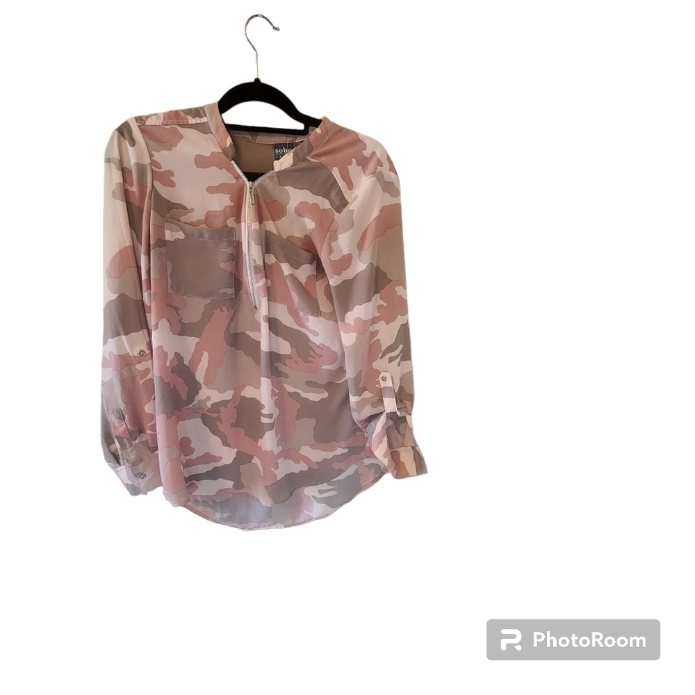 Pink & tan Soho camo pullover blouse. One zipper in center. 2 pockets on…